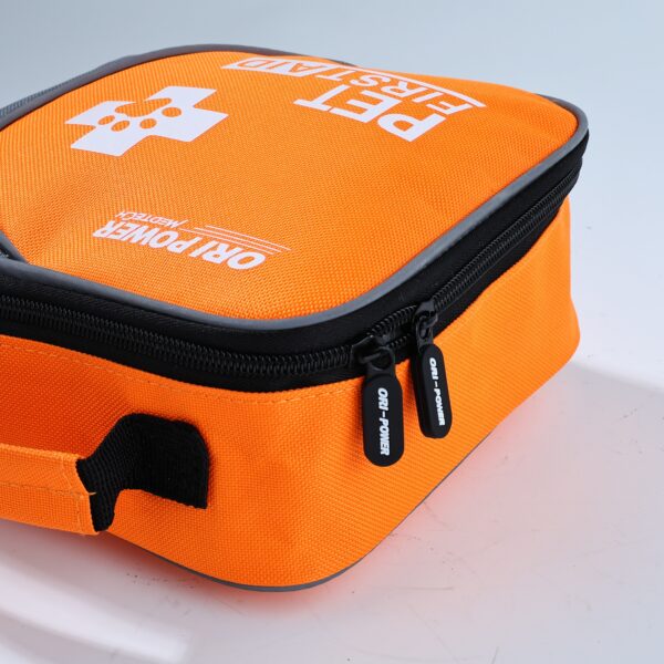 The image features a pet first aid bag in orange and black, highlighting its importance for pet health and safety.