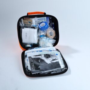 An orange and black bag for pet first aid, emphasizing its role in providing emergency care for animals.